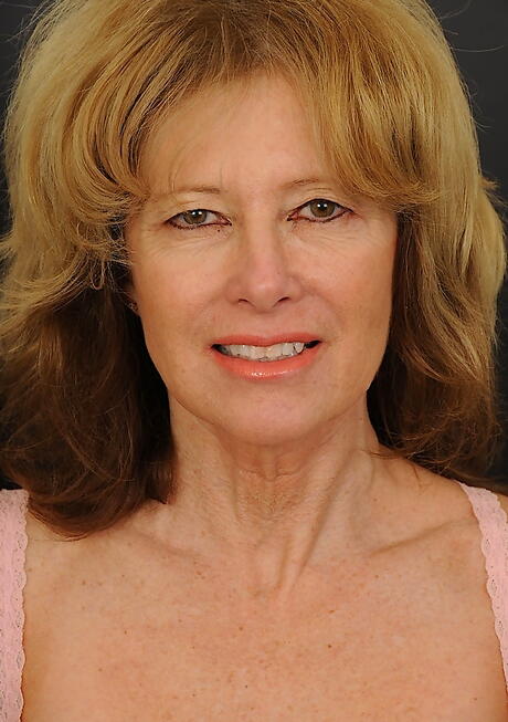 Hot blonde mature Janet in hot undies bares small tits and spreads her legs 